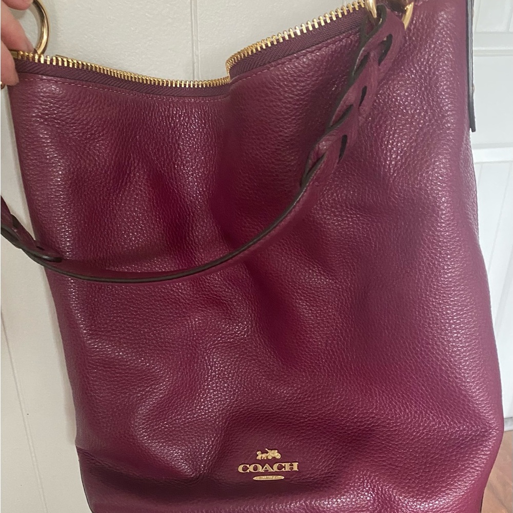 Coach bucket bag of a gorgeous raspberry color!